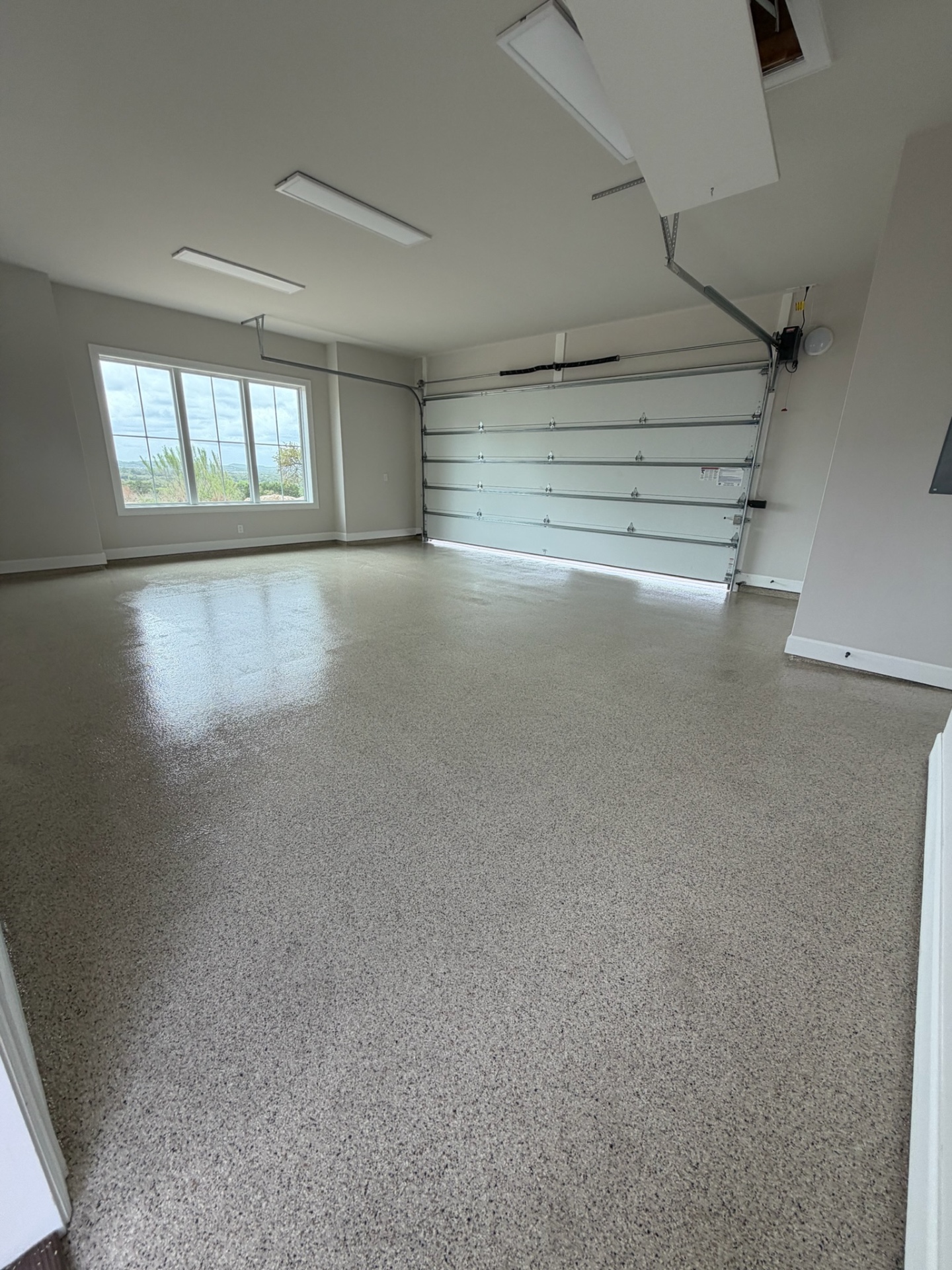 Finished flake garage floor with hill country view
