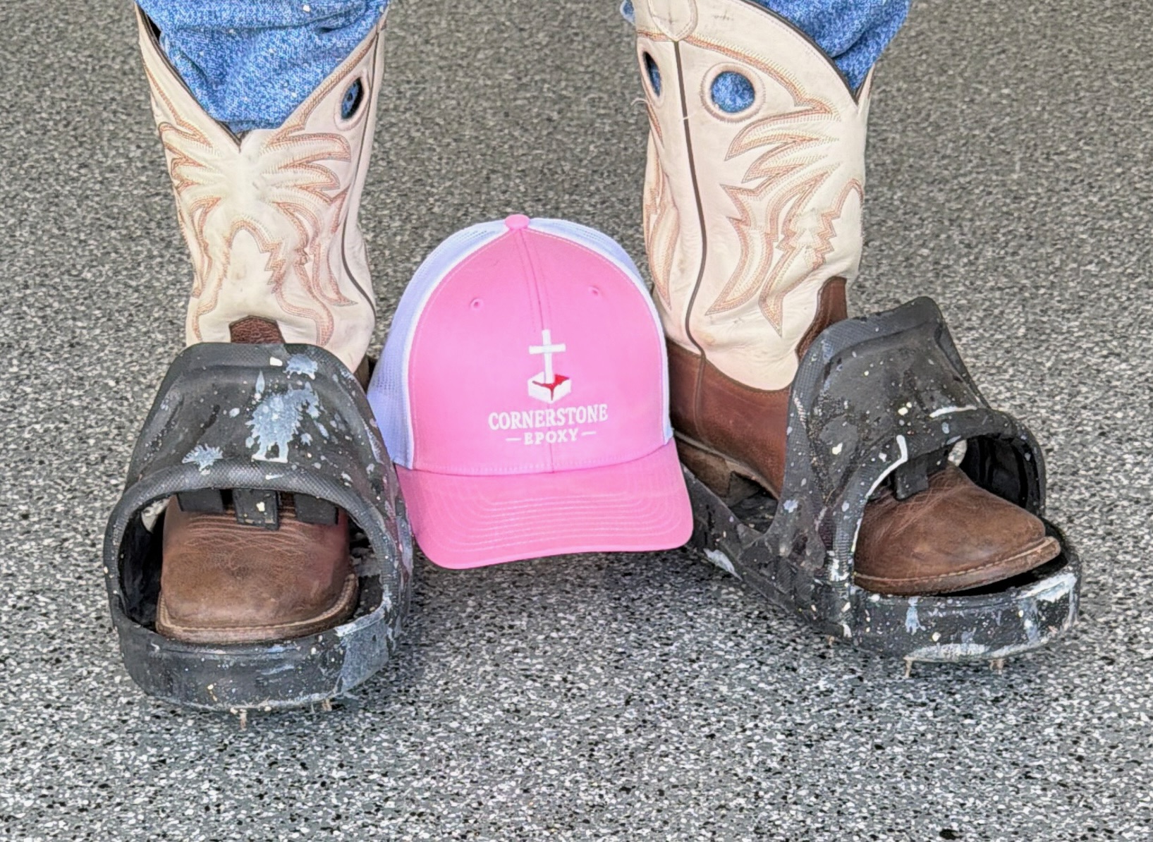 Cornerstone Epoxy cap between cowboy boots and spiked epoxy shoes
